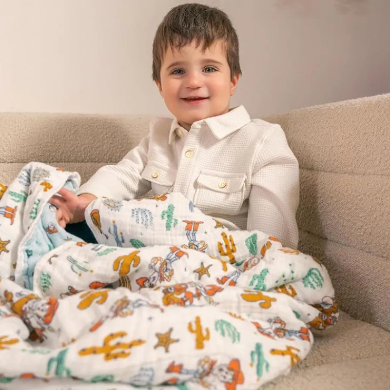 aden__anais__essentials_c_SKUtYX2dvTx_4.webp Aden + Anais - Essentials Cotton Muslin Blanket Toy Story, Woody & Friends Clearance