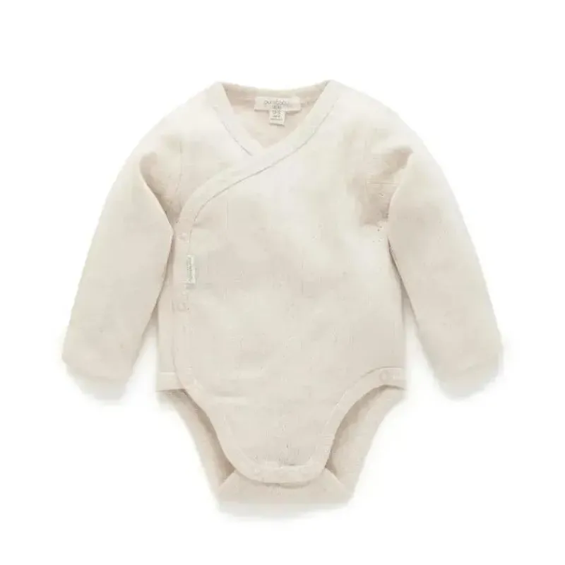body_manga_longa_pure_bab_SKUBzWkJ2cT_0.webp Pure Baby Body manga longa - Baby Pointelle neutro manga longa, melange de trigo Sale
