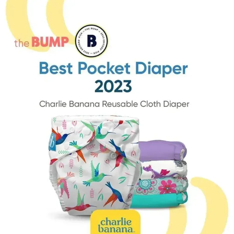 charlie_banana__fralda_de_SKUjEQy2u40_1.webp Charlie Banana - Fralda de pano lavável reutilizável, tamanho único ajustável, a baleia em branco Outlet