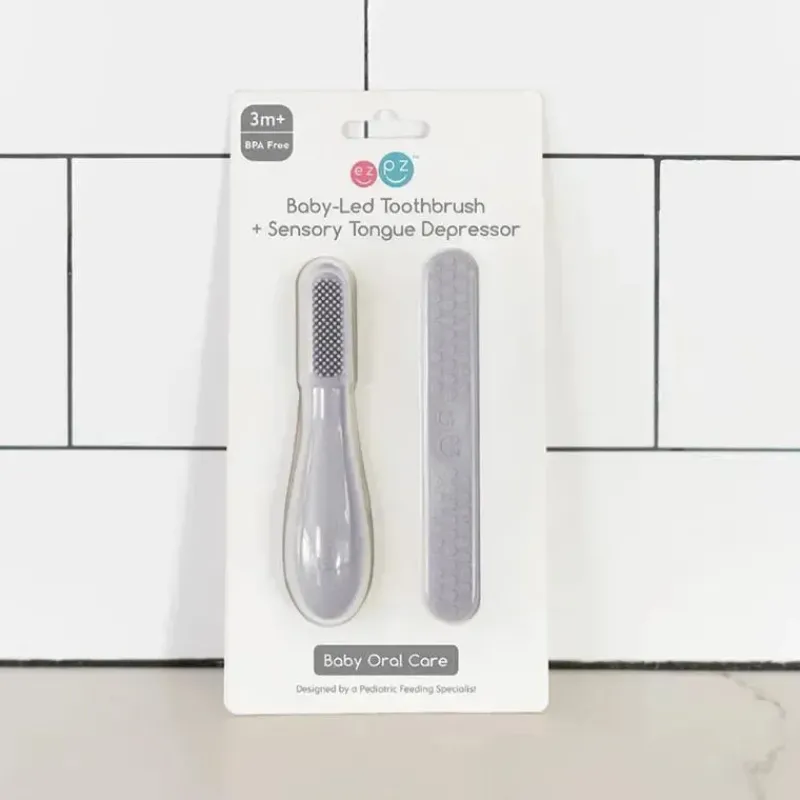 ezpz__escova_de_dentes_ba_SKUW4TN7x41_2.webp ezpz - Escova de dentes Baby-Led™ + Depressor de língua sensorial, pacote duplo, estanho Clearance