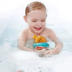 Hape - Brinquedo de banho de corda infantil Little Splashers nadador de pelúcia New