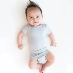 Kyte Baby - Baby Neutral Bodysuit In Storm Hot