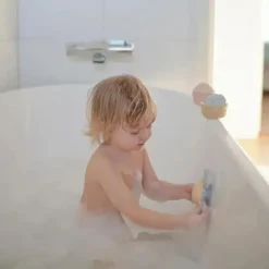 Mushie - Brinquedo giratório de sucção Sunshine para banho e brincadeira Outlet