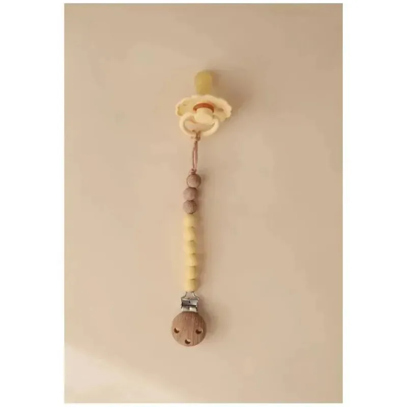 mushie__clipe_de_chupeta__SKU4f7W36rs_2.webp Mushie - Clipe de chupeta de silicone Eva, amarelo suave Clearance