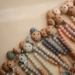 Mushie - Clipe de chupeta de bebê 100% silicone sem BPA, Eva Ash Fashion
