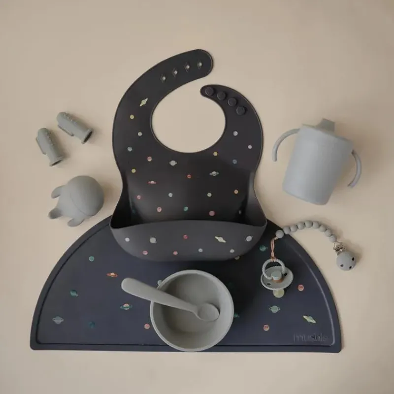 mushie__silicone_baby_bib_SKU1mxzmqM7_4.webp Mushie - Silicone Baby Bib, Planets Sale