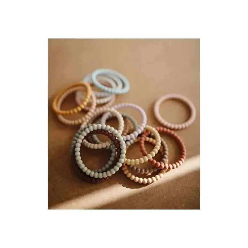 mushie_silicone_pearl_tee_SKU8H0zMYoO_2.webp Mushie Silicone Pearl Teether Bracallets Suave/Terracota/Pervinca New