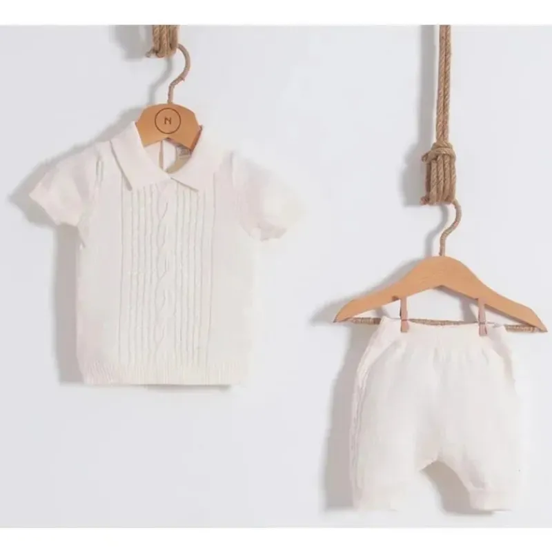nipperland__conjunto_de_r_SKUrqBsahAW_0.webp Nipperland - Conjunto de roupas de malha para bebê 2Pk creme Clearance