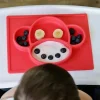Nuby - Sure Grip Mini Placemat de Silicone, Macaco Vermelho Hot