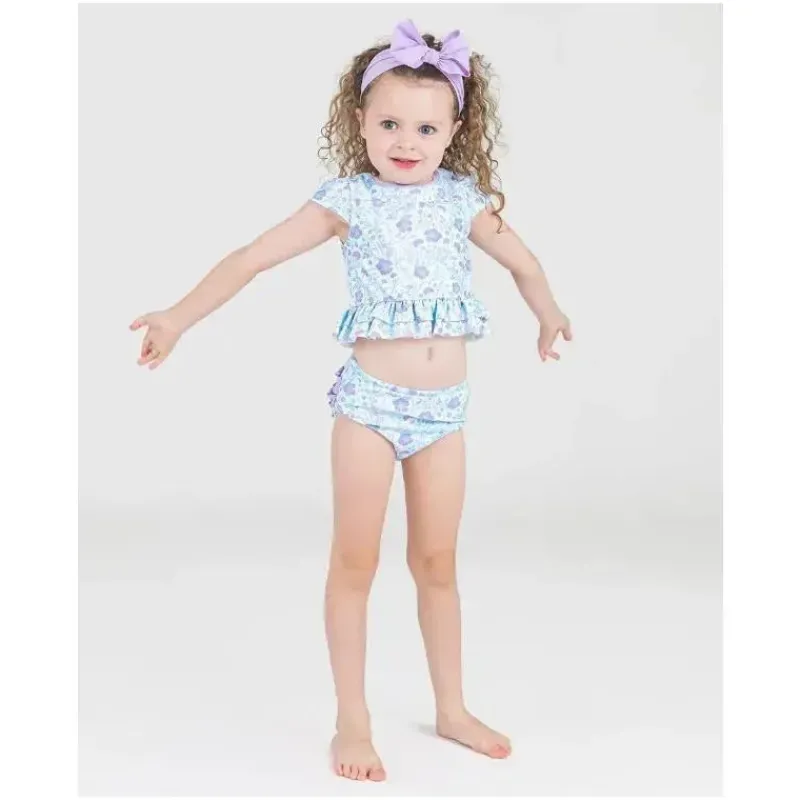 rufflebutts__biquni_pk_ba_SKUA8QWN2zv_1.webp RuffleButts – Biquíni 2Pk Baby Girl Fairytale Garden Cap Sleeve Ruffle Hem Online